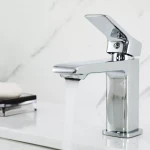 Смеситель для умывальника FRAP F1084 однорычажный с литым изливом латунный корпус крепления гайкой хром, диаметр 35 мм.